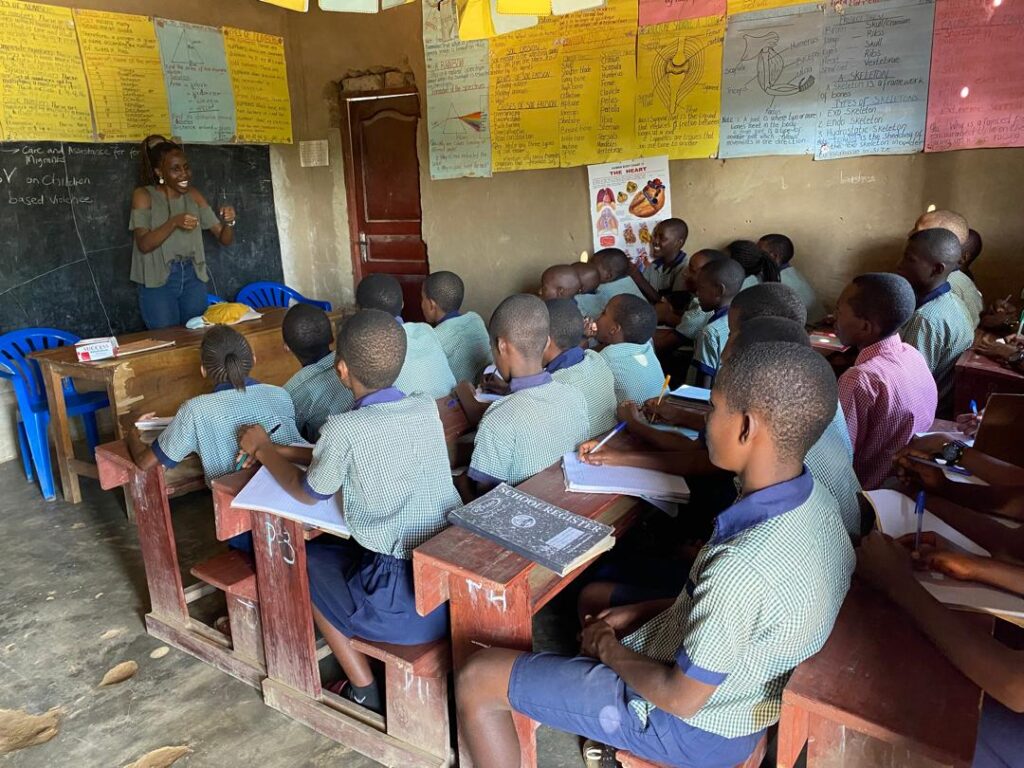 The founder addressing children during a session.